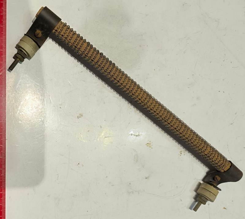 keramická tyčka z topného tělesa, délka 235mm, se spirálou ( určeno na ND), dle foto