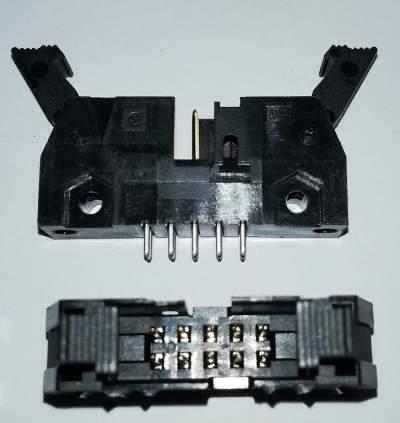 5499160-1 - AMP-LATCH Universal Headers, Ribbon Cable Connectors, Wire-to-Board, 10 Position, 2.54mm .. balení 20ks